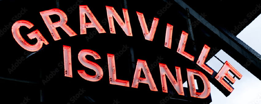 Lit-up red Granville Island sign
